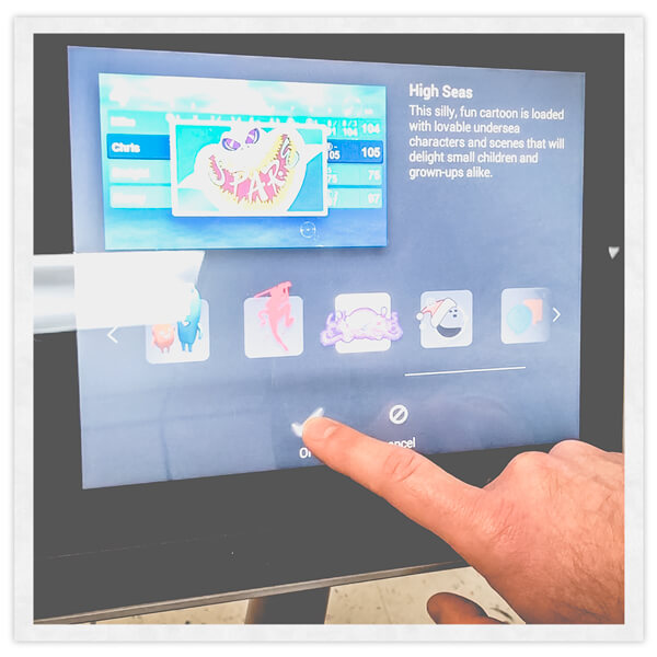 Our interactive touchscreen bowling tablet displaying Brunswick Sync games
